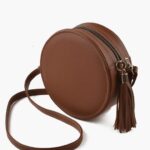 Brown circle cross-body bag