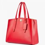 Red multi compartment satchel bag